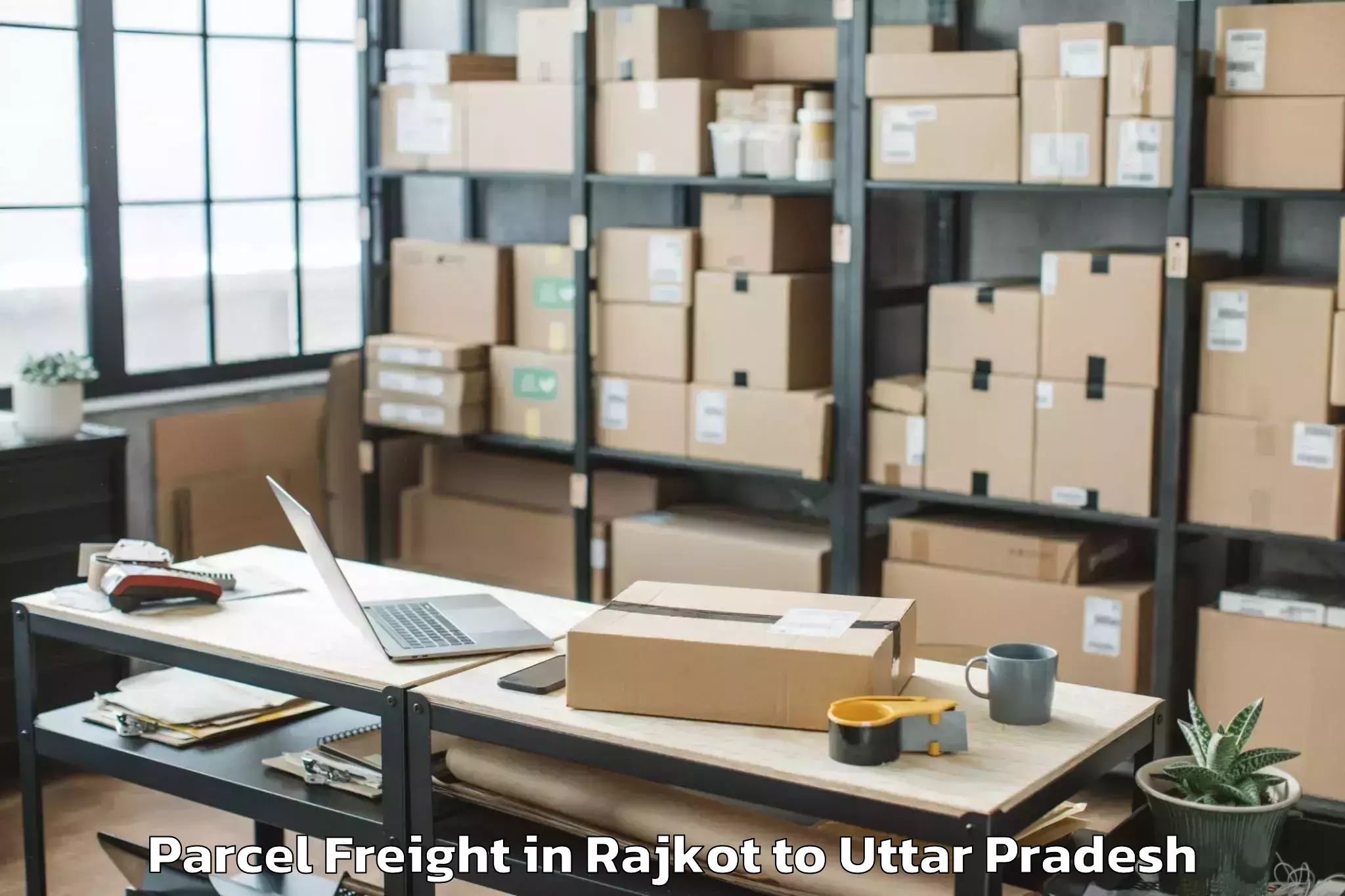 Top Rajkot to Purwa Parcel Freight Available